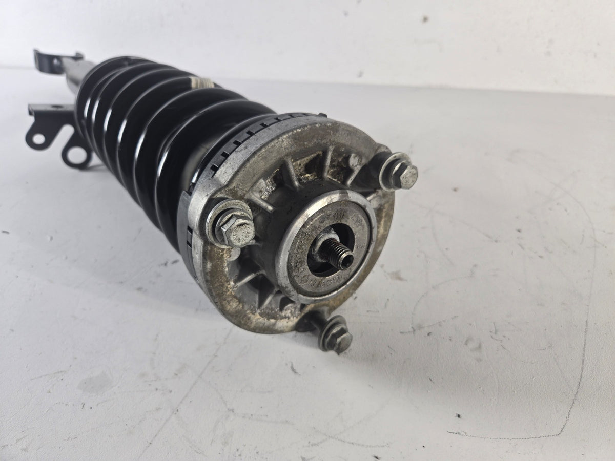 2010 2013 BMW 550i 4.4L RWD Left Driver Front Shock Absorber Strut Coil Spring