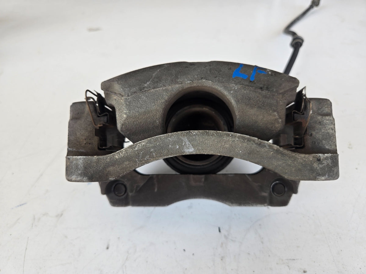 2014 2020 Nissan Rogue US built left driver front wheel brake caliper OEM 2 row