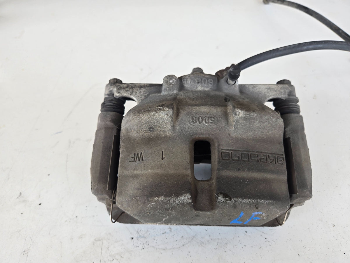 2014 2020 Nissan Rogue US built left driver front wheel brake caliper OEM 2 row